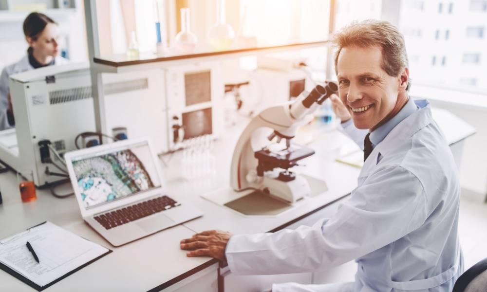 group of scientists working at the laboratory